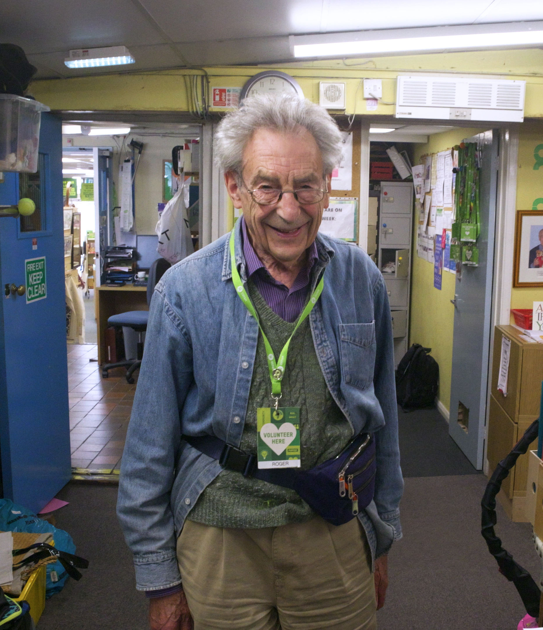 Oxfam volunteer Roger in a shop