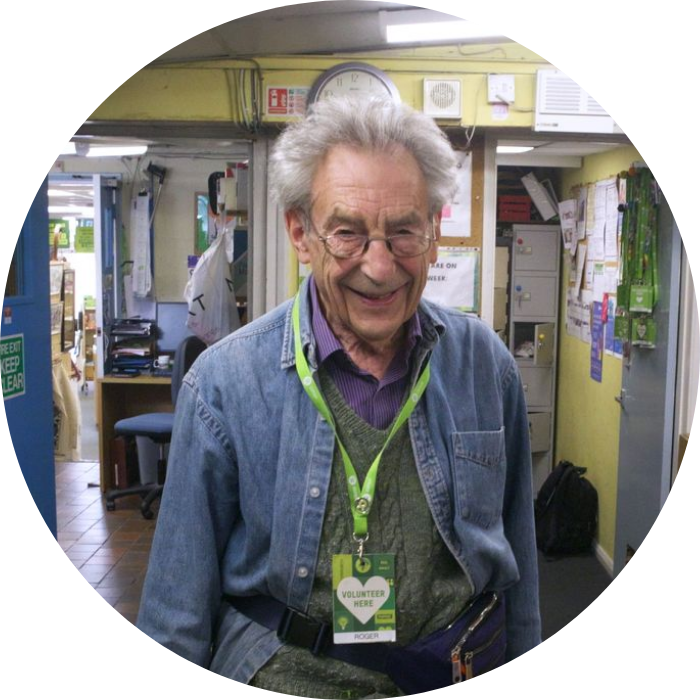 Oxfam volunteer Roger in a shop